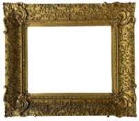 Frames - Early 20th century ornamented gilt frame aperture 35cm x 44cm overall 56cm x 65cm