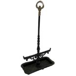 Black painted cast iron boot scraper with handle
