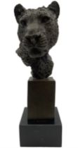 Bronze leopard bust