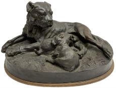After W. Wolfe; bronze cast figural group depicting bullmastiff feeding puppies