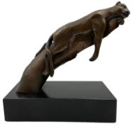 Bronze modelled as a cougar on a branch upon a rectangular wooden plinth