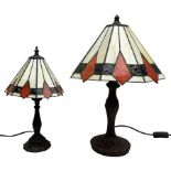 Tiffany style lamp with geometric pattern and matching small example