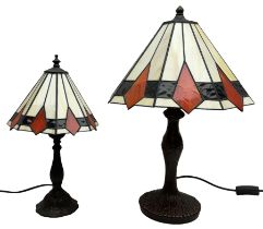 Tiffany style lamp with geometric pattern and matching small example