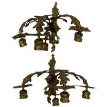 Pair of Rococo style four branch gilt wall sconces