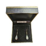 Pair of silver opal pear shaped pendant earrings