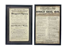 Two framed advertising posters