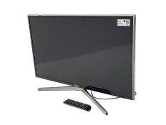 SAMSUNG UE32H6400ALK television with remote