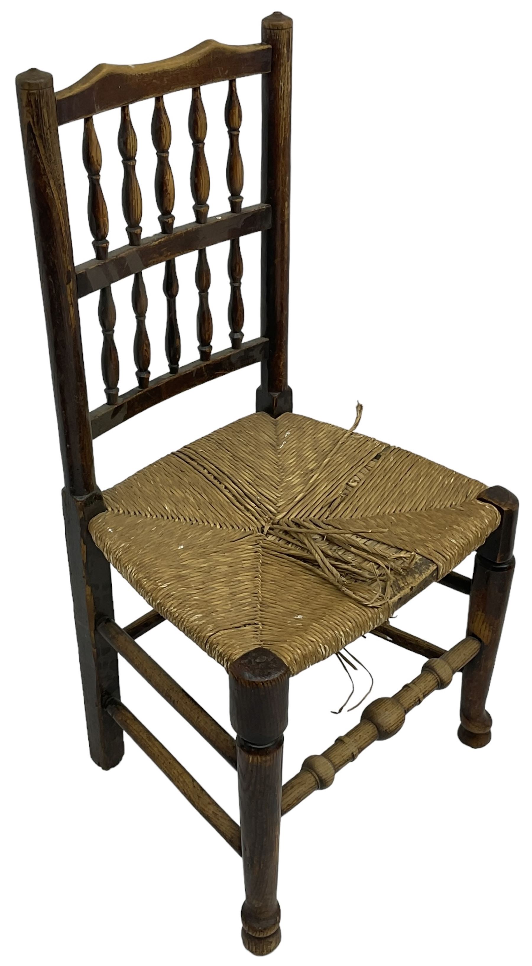 Collection of chairs - five 19th century elm spindle back chairs with rush seats; two chapel chairs - Image 4 of 10