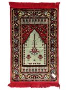 Turkish crimson and light blue ground prayer rug