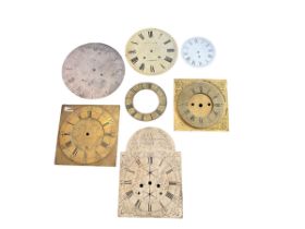 Six clock dials and an engraved brass chapter ring. Comprising of four 18th century brass longcase