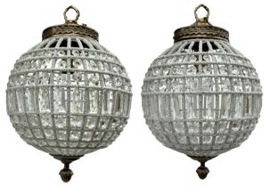 India Jane Interiors - pair of gilt metal and glass spherical ceiling light pendants