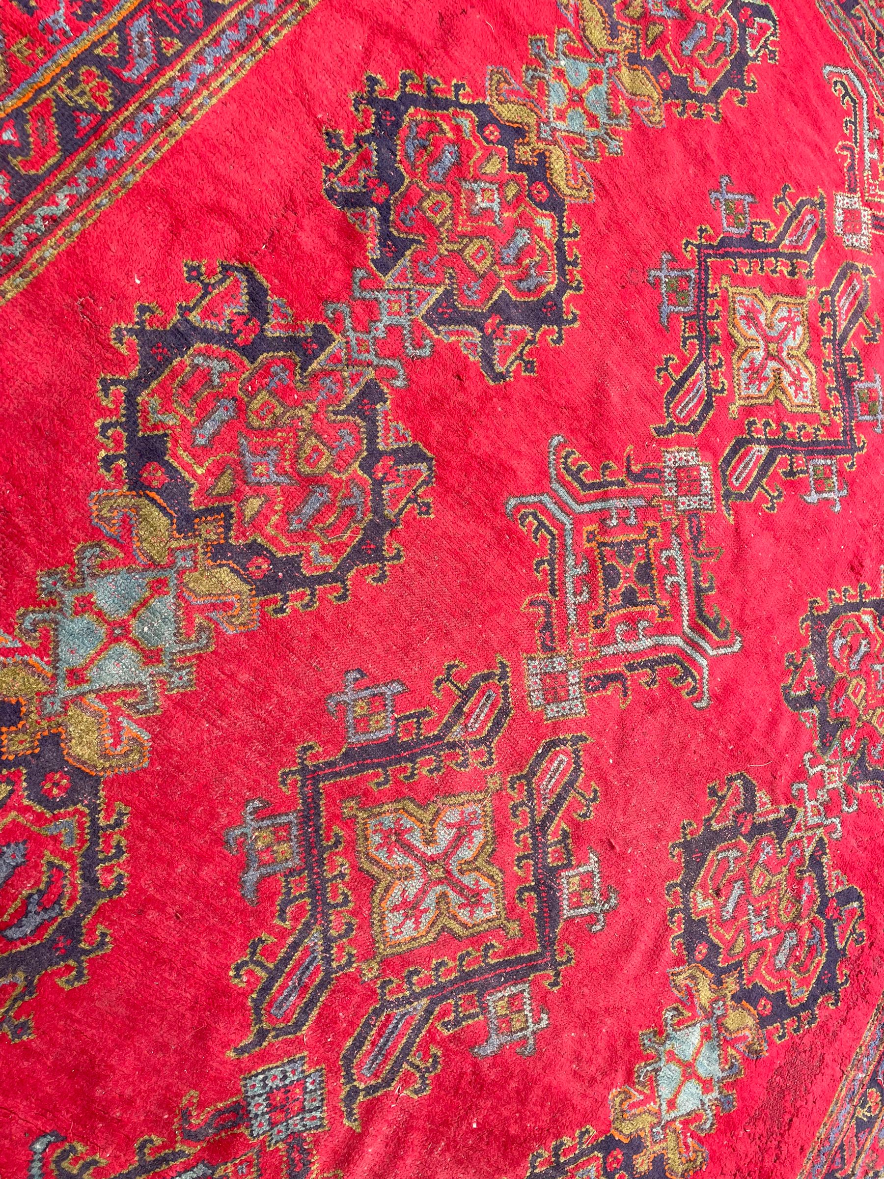 Early 20th century Western Anatolia Turkish Oushak crimson ground carpet - Image 10 of 10