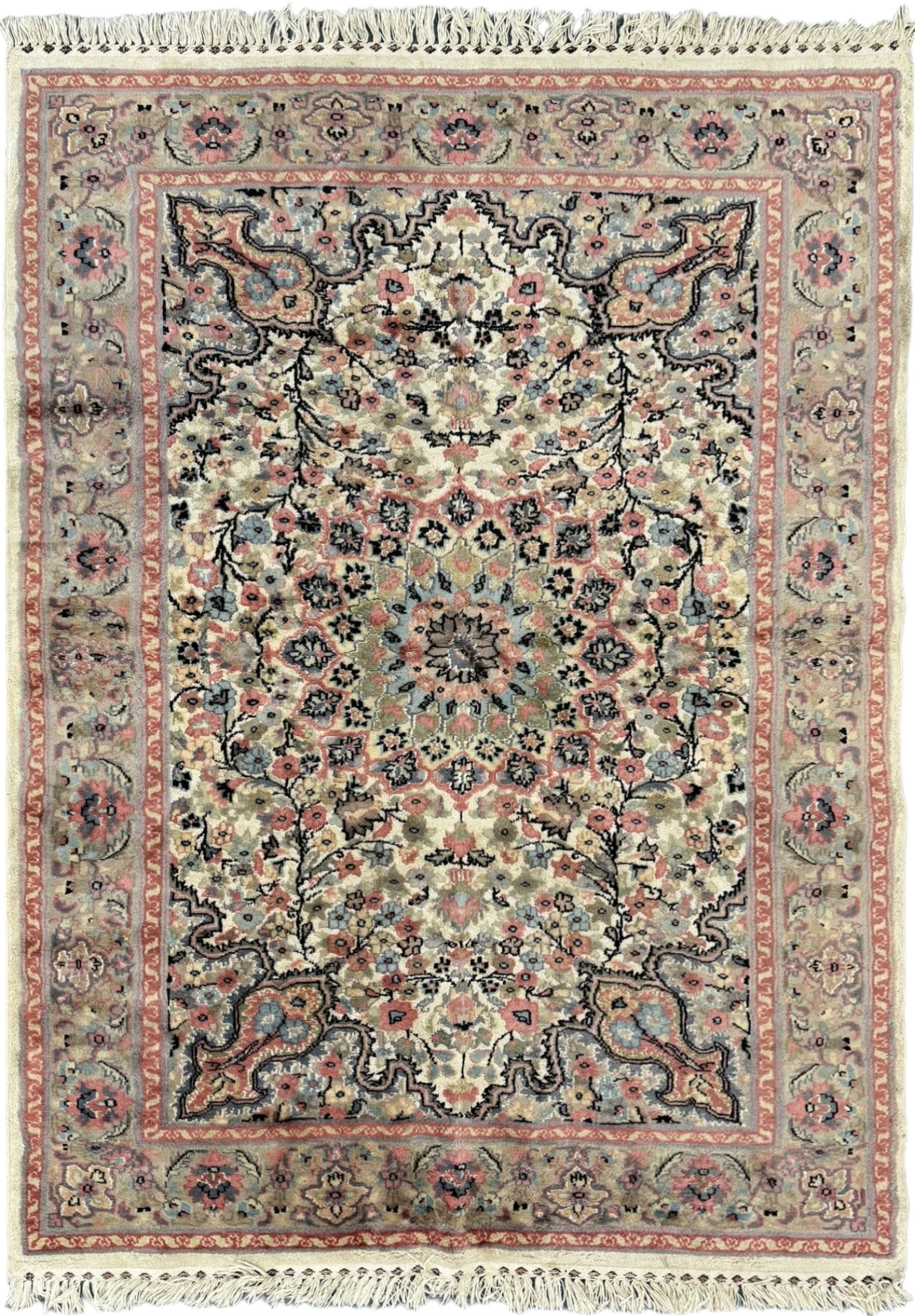 Persian design ivory and pink ground rug