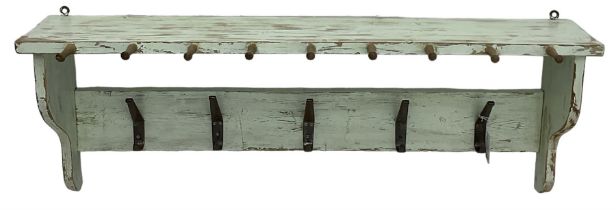 Distressed paint and wax finish wall hanging coat rack