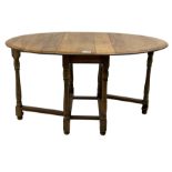 Mid-to-late 20th century oak and beech drop-leaf dining table