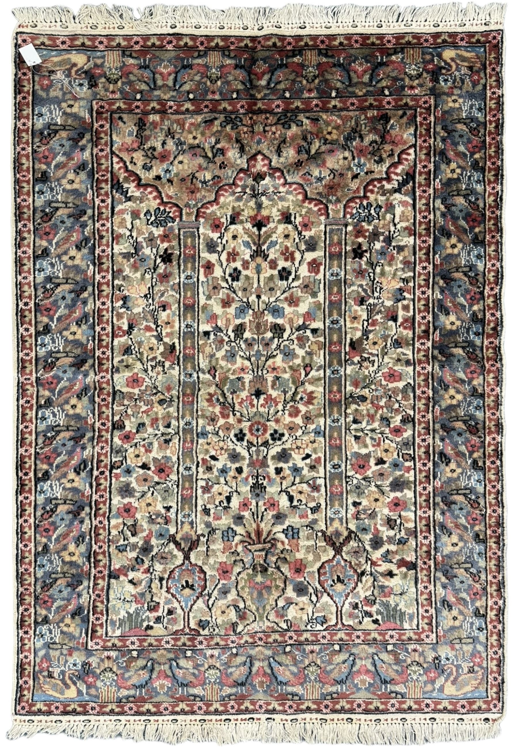 Persian design ivory ground rug