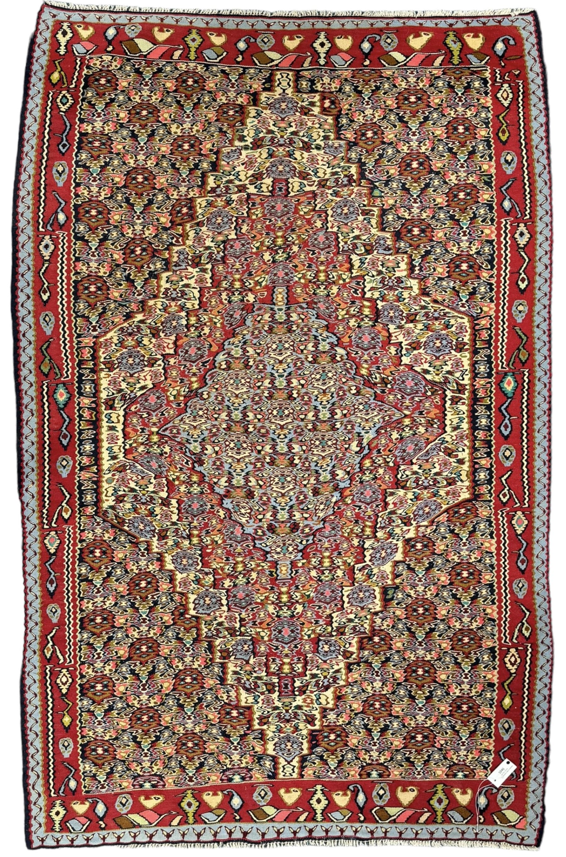 Senneh Kilim crimson ground rug