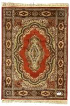 Persian design crimson ground rug