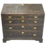 18th century heavily carved oak bureau