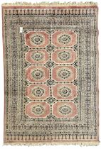 Persian design pale pink ground rug