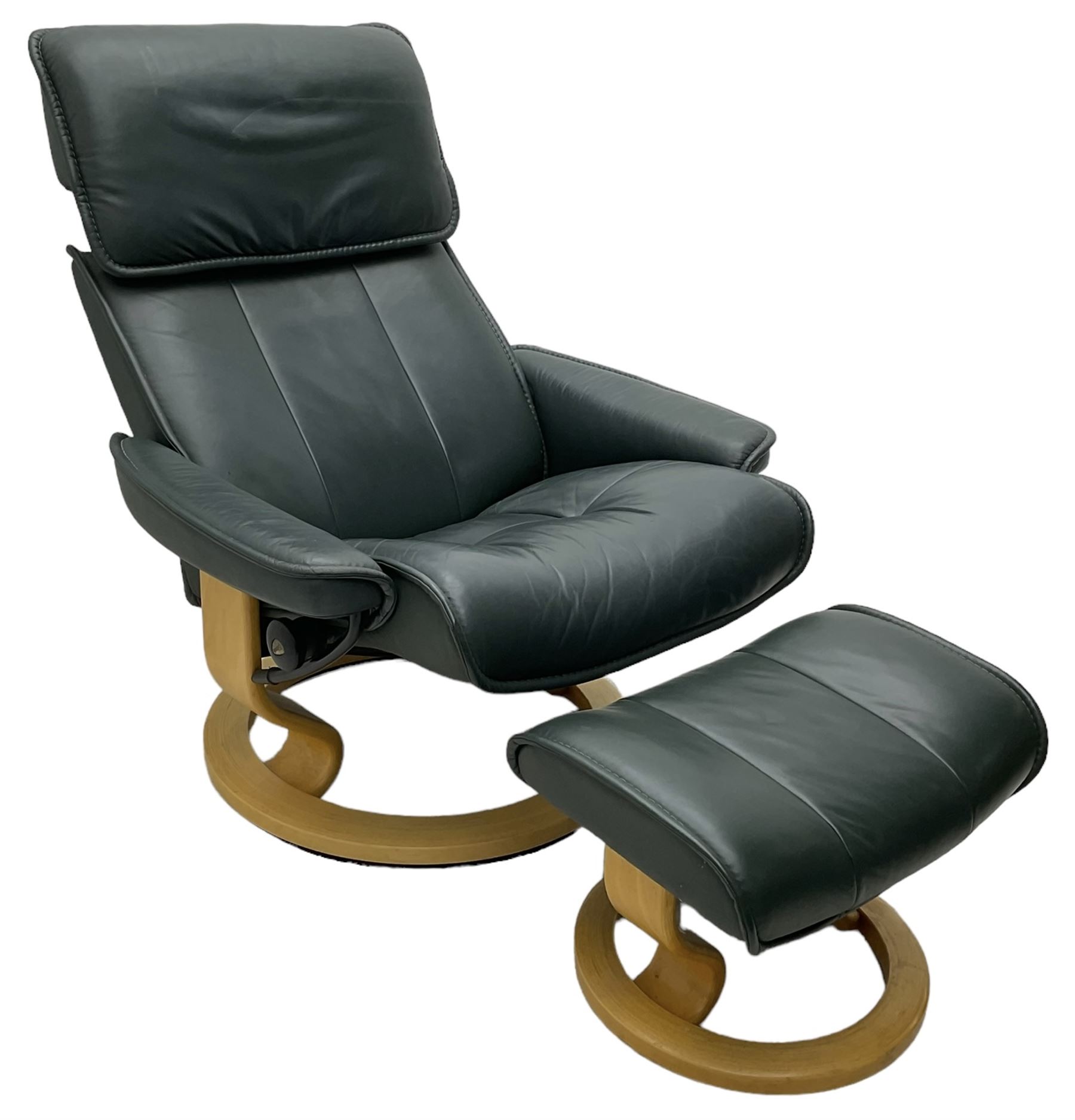 Ekornes Stressless - swivel and reclining armchair upholstered in green leather; matching stool