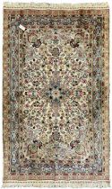 Persian design ivory ground rug