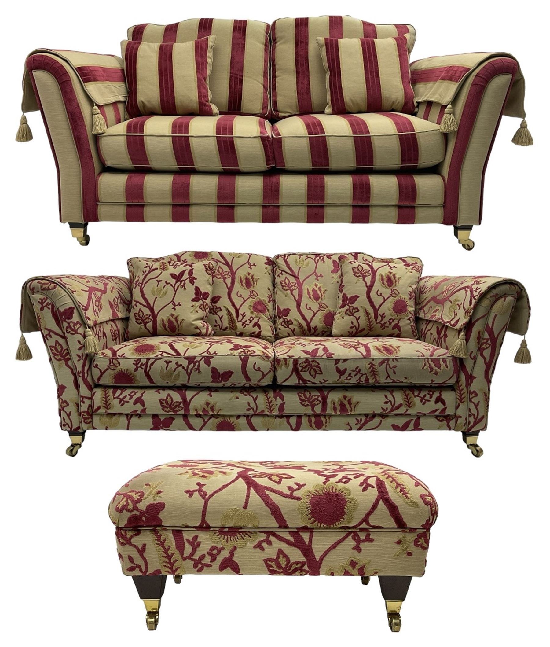 Three-piece lounge suite - large two-seat sofa upholstered in red and gold striped fabric (W185cm