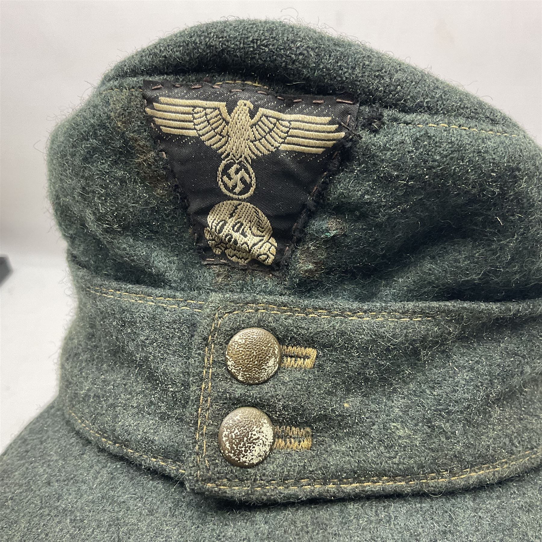 WWII German M43 field cap with 'SS' cloth badge and mountain trooper's edelweiss metal badge - Image 2 of 12
