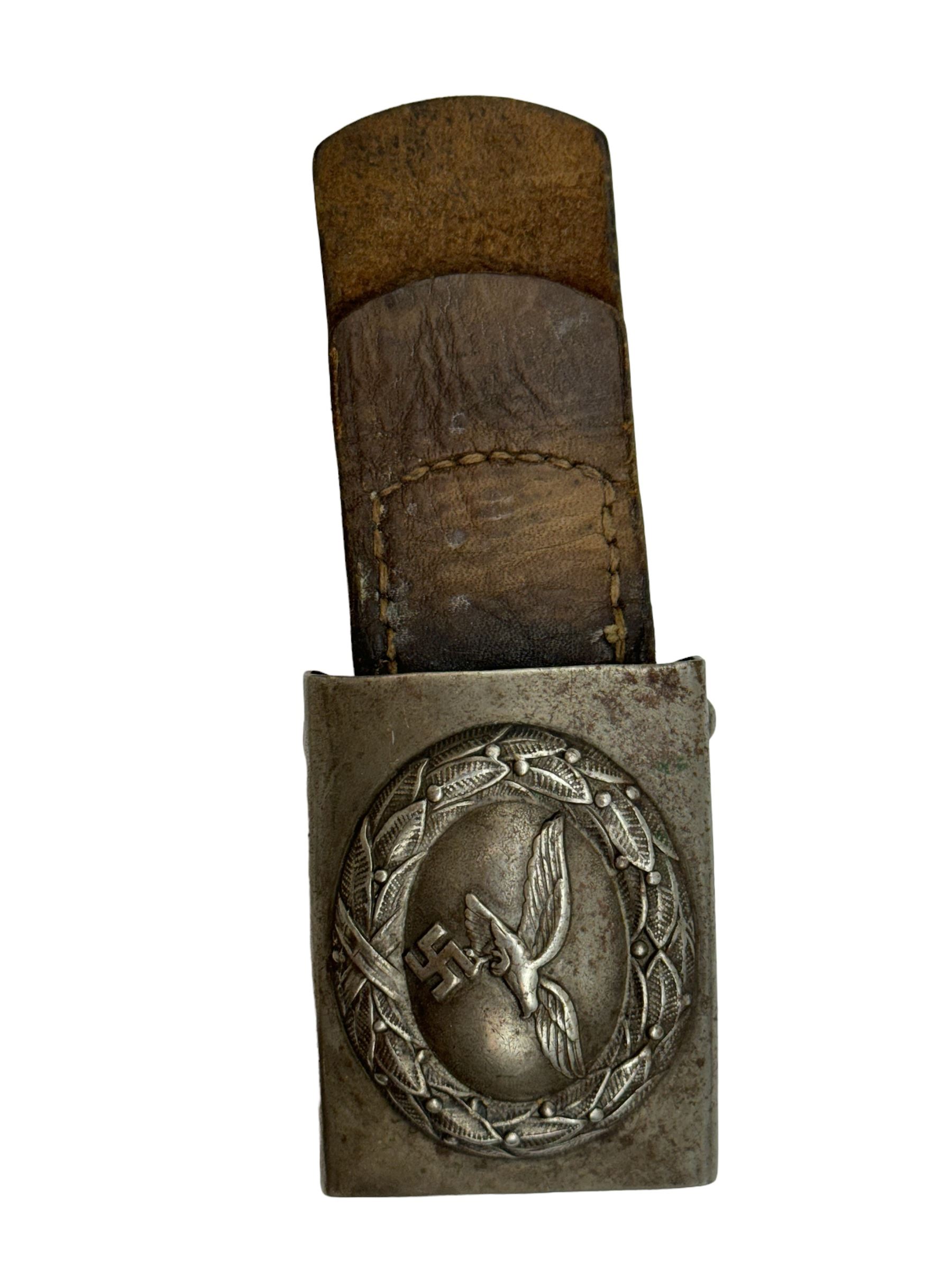 WWII Third Reich German Luftwaffe buckle depicting the Reichsadler clutching a Swastika surrounded b