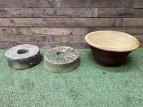 Pair of small stone mill stones and glazed pancheon
