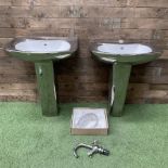 Pair of chrome pedestal basins with single tap and pair of drains