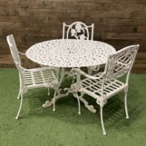 Cast aluminium circular garden table and three chairs