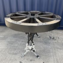 Industrial style cart wheel table