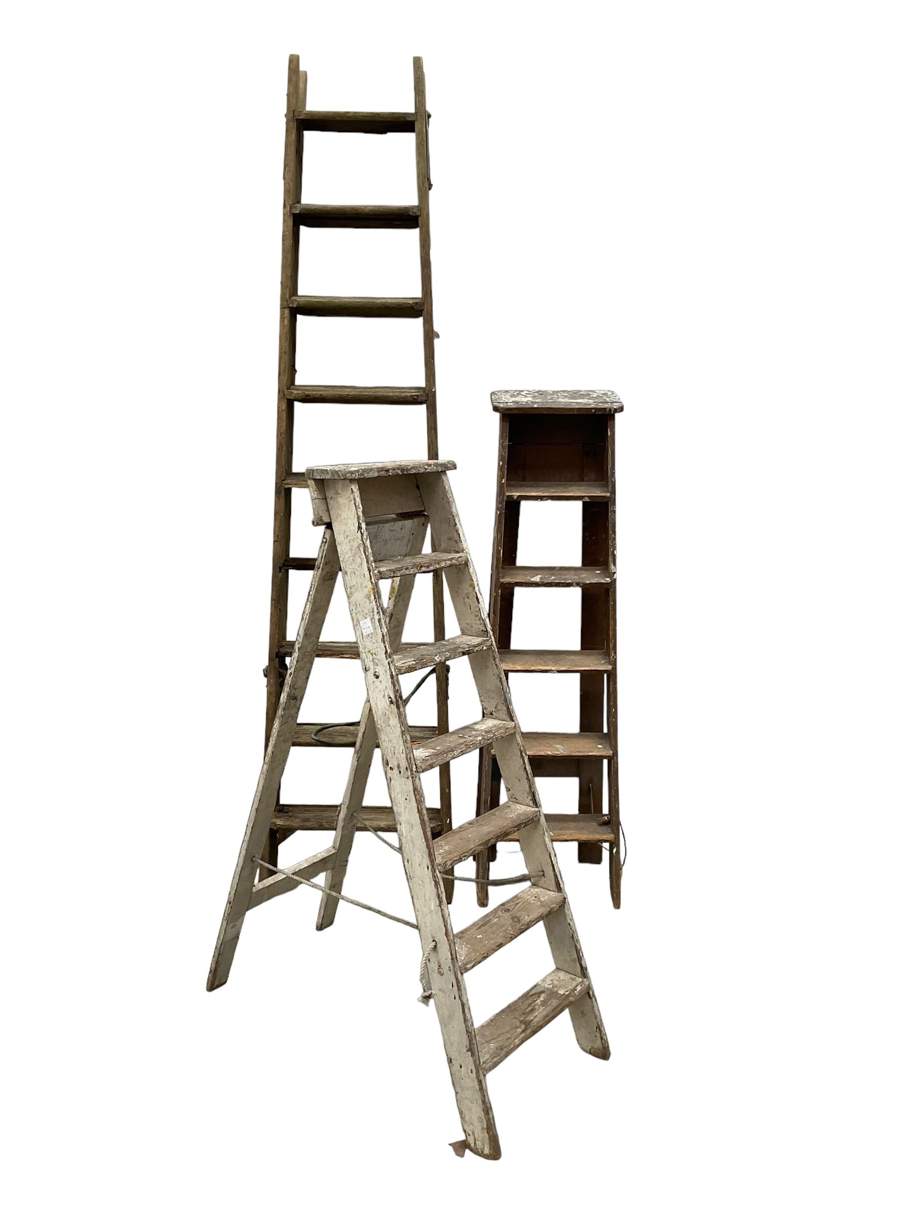 Set of three vintage wooden step ladders