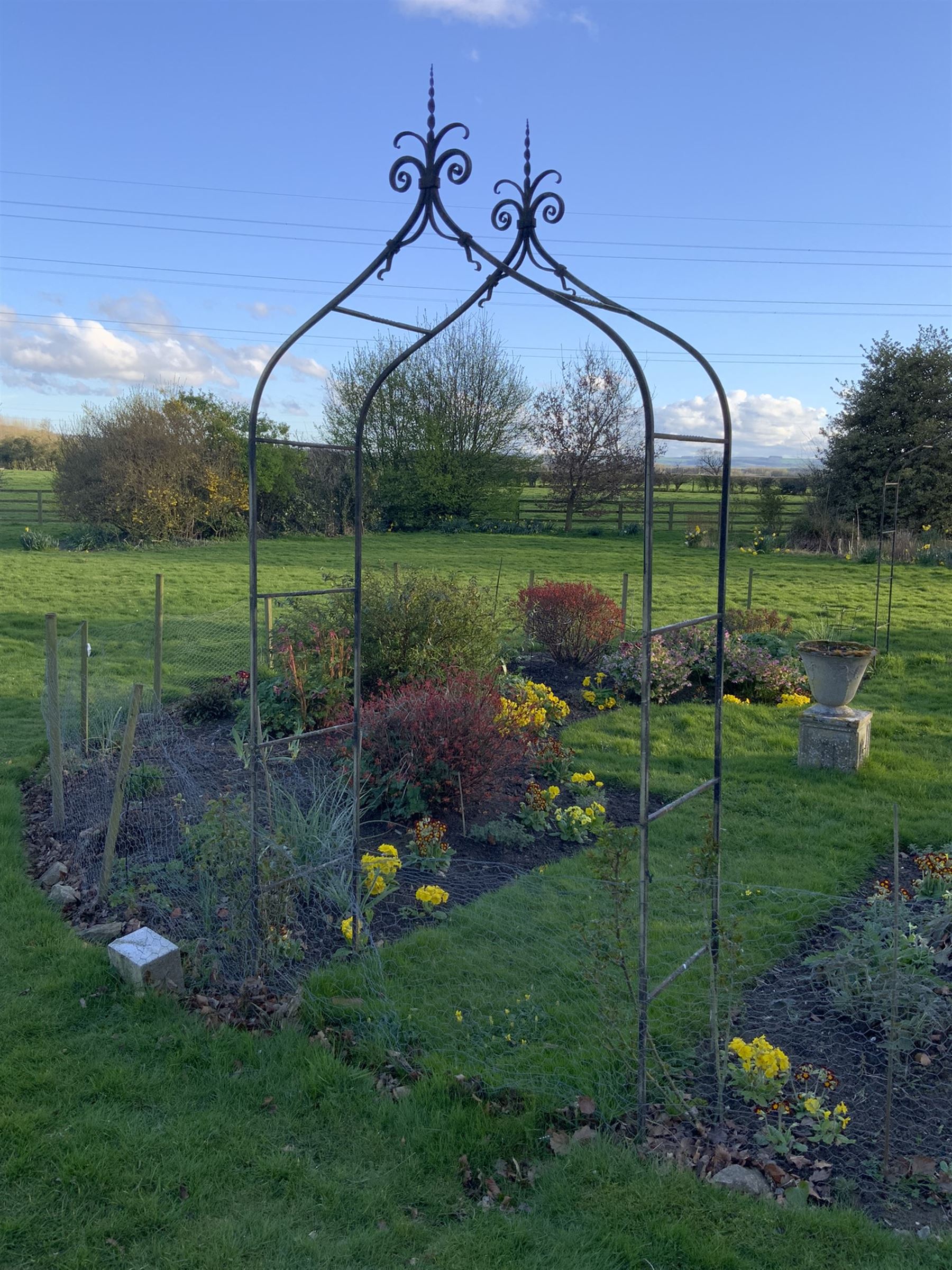 Bespoke wrought iron garden rose arbour