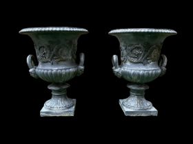 Pair of Victorian ornate cast iron garden urns