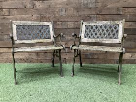 Pair of cast iron and wood slatted garden bench seats