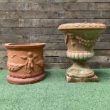 Circular terracotta garden planter