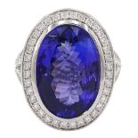 18ct white gold oval cut tanzanite and round brilliant cut diamond ring