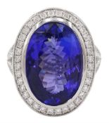 18ct white gold oval cut tanzanite and round brilliant cut diamond ring