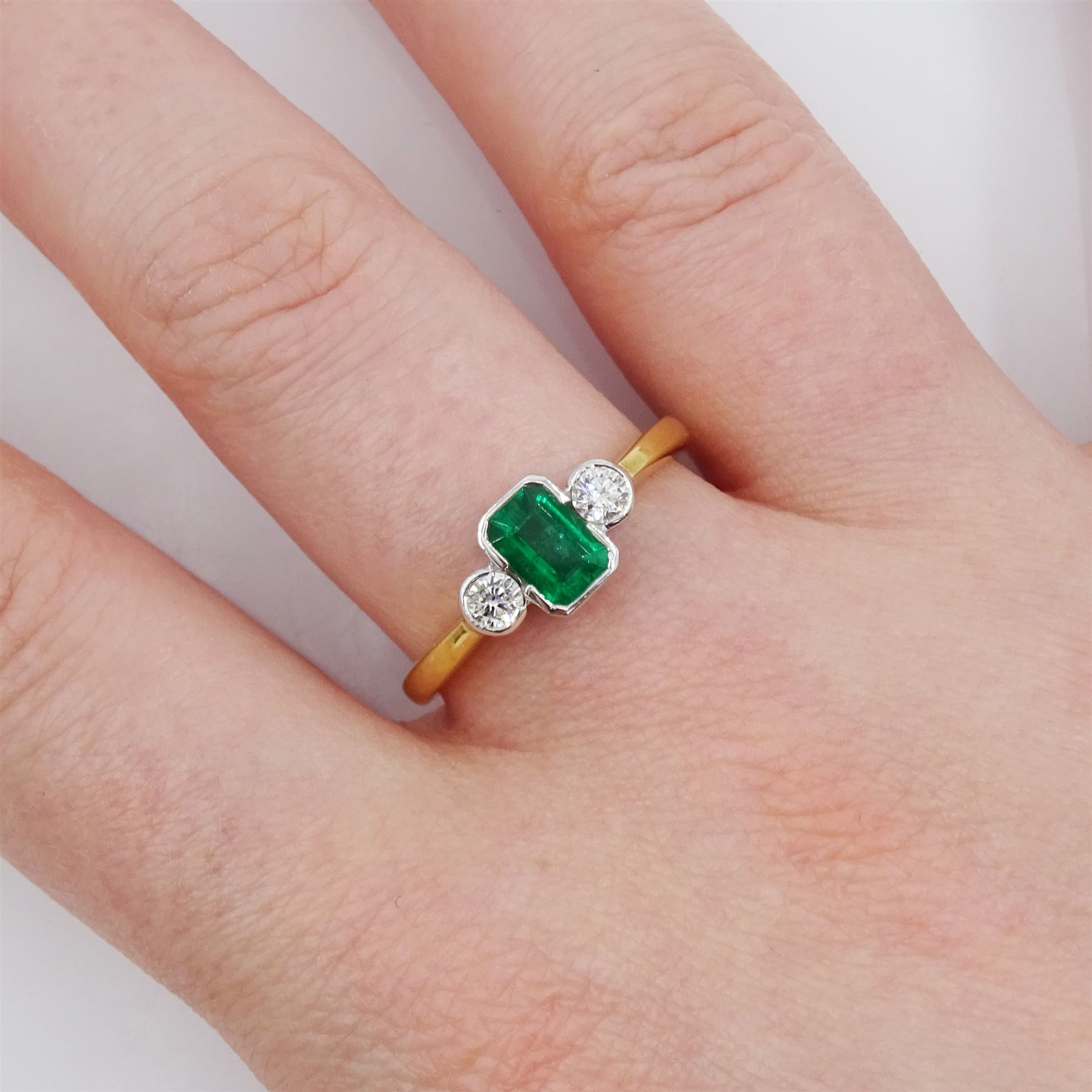 18ct gold three stone octagonal cut emerald and round brilliant cut diamond ring - Image 2 of 4