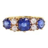 Early 20th century 18ct gold three stone cushion cut sapphire and four stone old cut diamond ring