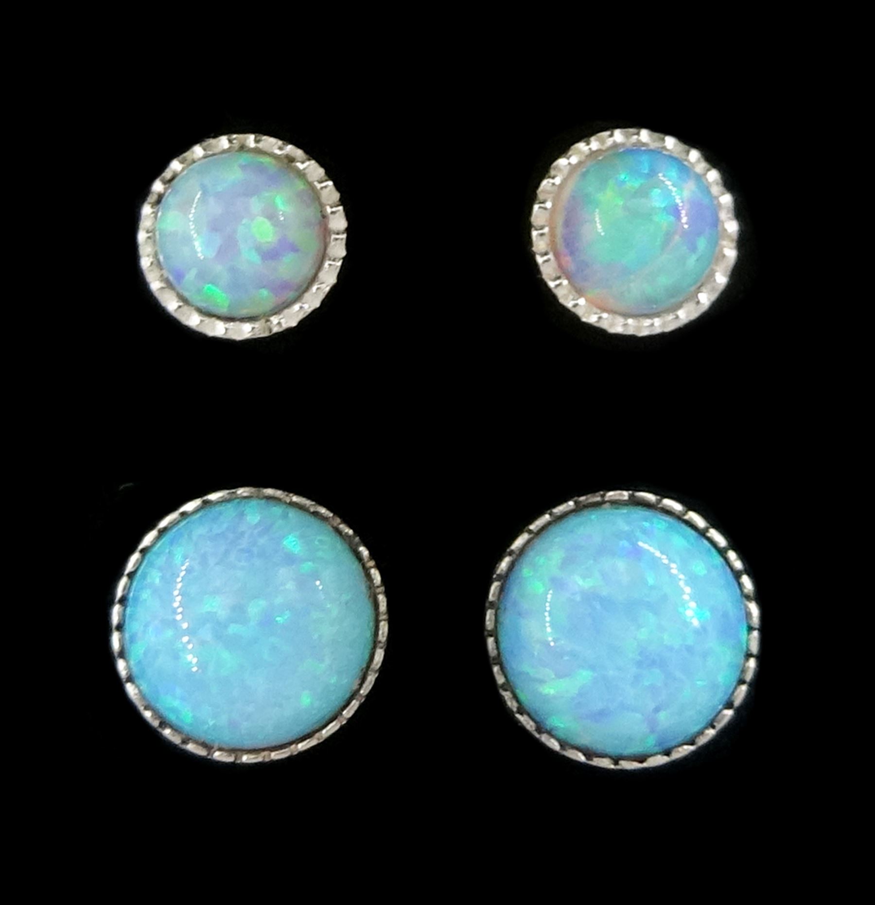 Two pairs of silver opal stud earrings