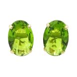 Pair of 9ct gold green stone set stud earrings