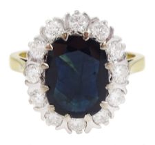 18ct gold oval cut sapphire and round brilliant cut diamond cluster ring