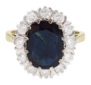 18ct gold oval cut sapphire and round brilliant cut diamond cluster ring