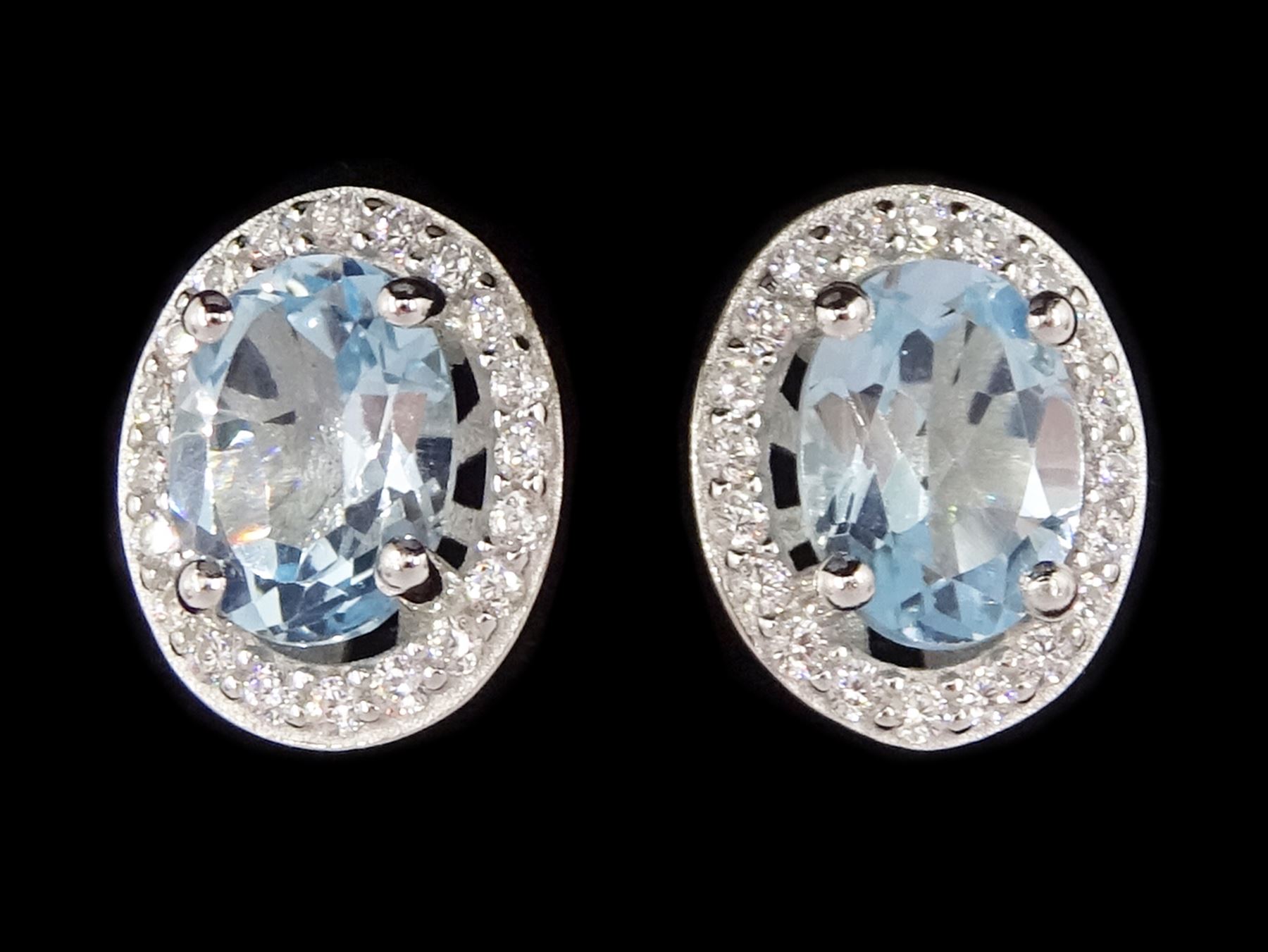 Pair of silver blue topaz and cubic zirconia stud earrings