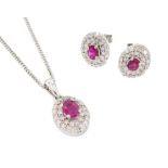 Pair of 9ct white gold oval cut ruby and round brilliant cut diamond cluster stud earrings and a mat