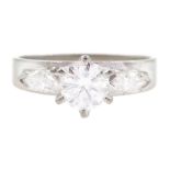 18ct white gold three stone round brilliant cut and marquise cut diamond ring