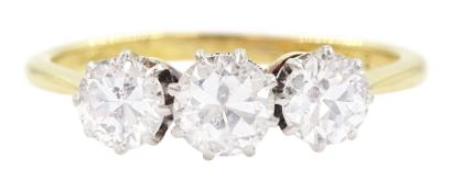 18ct gold three stone transitional cut diamond ring